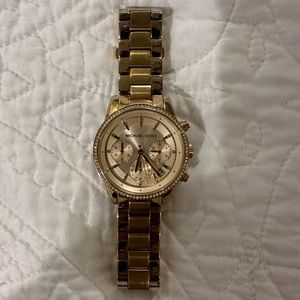 Michael Kors gold watch with stone bezel